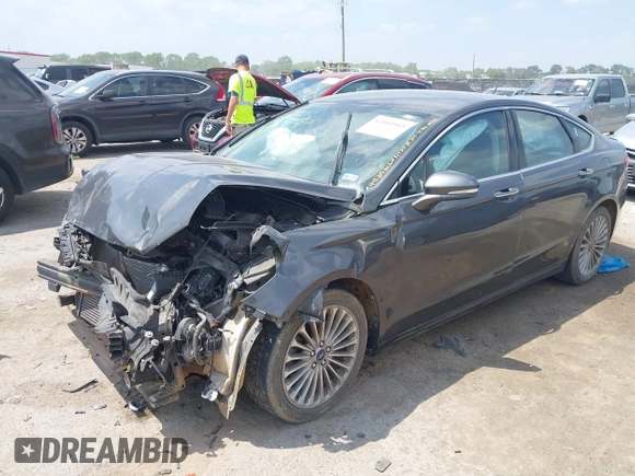 2016 Ford Fusion Titanium with VIN 3FA6P0K97GR217062, listed as a IAAI auction lot 42044943 with Not Provided miles and . Bid and sale history available at carsss.com. Image 18.