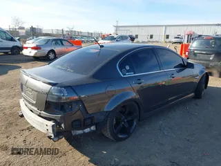 2009 Pontiac G8 GT with VIN 6G2EC57YX9L221534, listed as a IAAI auction lot 41227662 with 130,941 mi miles. Bid and sale history available at carsss.com. Image 4.