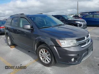 2017 Dodge Journey SXT z VIN 3C4PDCBG0HT518364, wystawiony jako IAAI lot #42320159 z przebiegiem 219 061 mil mil oraz . Historia ofert i sprzedaży dostępna na DreamBid. Obrazek 1.