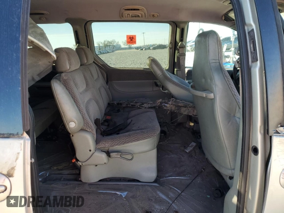 1999 Plymouth Voyager Grand SE z VIN 1P4GP44G1XB579504, wystawiony jako Copart lot #50064475 z przebiegiem Nie podano mil oraz Nie do naprawy. Historia ofert i sprzedaży dostępna na DreamBid. Obrazek 12.