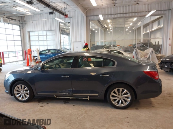 2014 Buick LaCrosse Leather with VIN 1G4GB5G39EF132695, listed as a IAAI auction lot 41728596 with 124,639 mi miles and . Bid and sale history available at DreamBid. Image 14.
