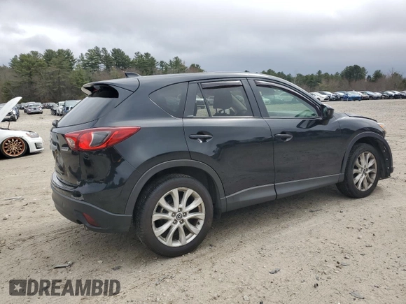 2014 Mazda CX-5 Grand Touring with VIN JM3KE4DY5E0392571, listed as a Copart auction lot 51044335 with 141,334 mi miles and Clean Title. Bid and sale history available at carsss.com. Image 3.