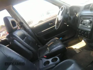 2000 Honda CR-V SE with VIN JHLRD1875YS012621, listed as a IAAI auction lot 42027584 with 211,710 mi miles. Bid and sale history available at carsss.com. Image 5.
