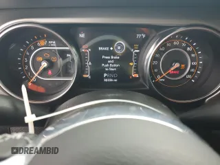 2022 Jeep Wrangler Unlimited Sahara с VIN 1C4HJXEN0NW262439, выставлен на аукционе Copart как лот 57469545 с пробегом 30 336 миль миль и Списание • Salvage title. История ставок и продаж доступна на DreamBid. Изображение 9.
