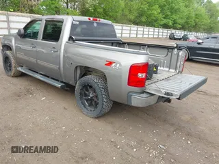 2013 Chevrolet Silverado 1500 LT with VIN 3GCPKSE78DG246175, listed as a IAAI auction lot 42106648 with 161,940 mi miles. Bid and sale history available at carsss.com. Image 3.