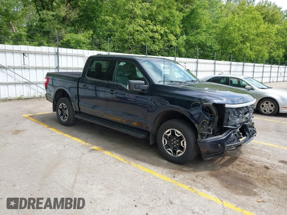 2023 Ford F-150 Lightning Pro with VIN 1FTVW1EL6PWG30061, listed as a IAAI auction lot 42362295 with 22,481 mi miles and . Bid and sale history available at DreamBid. Image 1.
