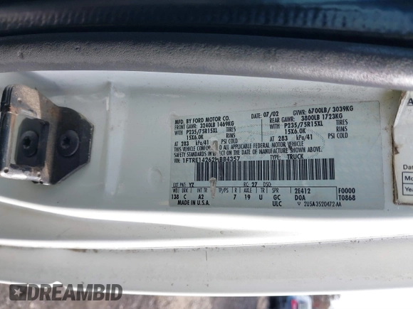 2002 Ford Econoline Cargo with VIN 1FTRE14262HB84357, listed as a IAAI auction lot 40880551 with 123,183 mi miles. Bid and sale history available at carsss.com. Image 9.