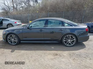 2016 Audi A6 2.0T Premium Plus with VIN WAUGFAFC7GN095669, listed as a IAAI auction lot 41894313 with 84,725 mi miles. Bid and sale history available at carsss.com. Image 15.