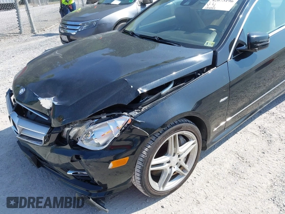 2012 Mercedes-Benz E 550 with VIN WDDKJ7DB5CF150395, listed as a IAAI auction lot 42673196 with 125,247 mi miles and . Bid and sale history available at DreamBid. Image 17.