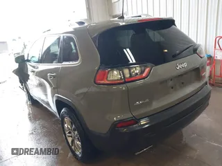 2021 Jeep Cherokee Latitude Lux with VIN 1C4PJMMX0MD214608, listed as a IAAI auction lot 41452997 with 31,441 mi miles and . Bid and sale history available at DreamBid. Image 3.