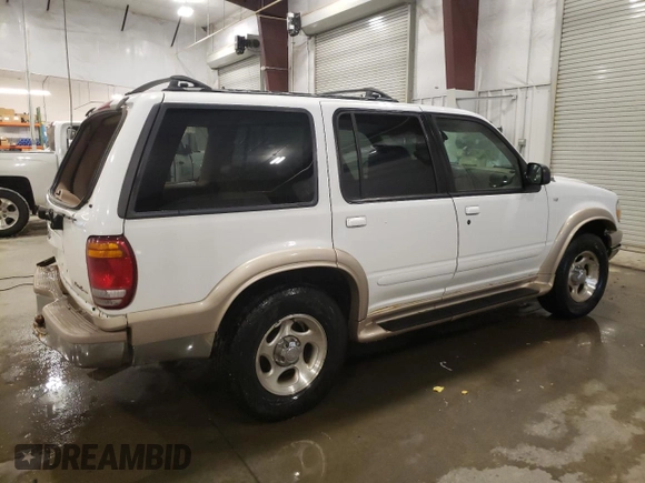 2000 Ford Explorer Eddie Bauer z VIN 1FMDU84P0YZC67167, wystawiony jako Copart lot #85806684 z przebiegiem 156 411 mil mil oraz Szkoda całkowita • Salvage title. Historia ofert i sprzedaży dostępna na DreamBid. Obrazek 3.