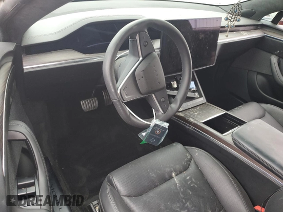 2021 Tesla Model S Plaid с VIN 5YJSA1E66MF436089, выставлен на аукционе Copart как лот 46114235 с пробегом Не указан миль и Списание • Salvage title. История ставок и продаж доступна на DreamBid. Изображение 8.