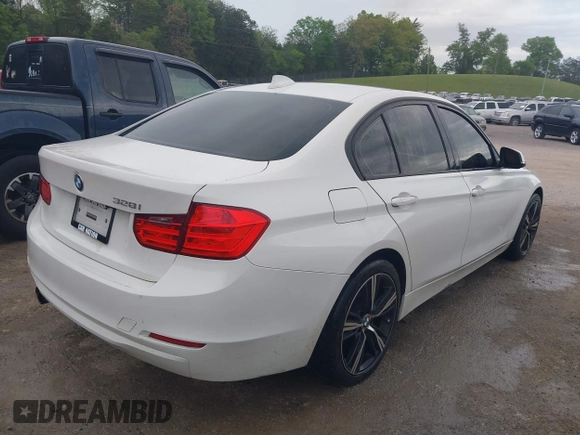 2012 BMW 3 Series 328i with VIN WBA3A5G57CNP16102, listed as a IAAI auction lot 42088407 with 70,608 mi miles and . Bid and sale history available at carsss.com. Image 4.
