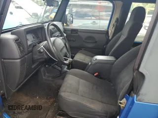 2003 Jeep Wrangler SE with VIN 1J4FA291X3P318888, listed as a Copart auction lot 61616535 with Not provided miles and Clean title. Bid and sale history available at DreamBid. Image 7.