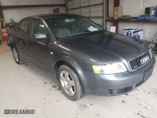 2004 Audi A4 1.8T with VIN WAULC68E04A055889, listed as a IAAI auction lot 41986309 with 124,598 mi miles. Bid and sale history available at carsss.com. Image 1.