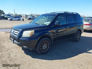 2006 Honda Pilot EX-L with VIN 2HKYF18596H512441, listed as a IAAI auction lot 41842107 with 248,844 mi miles. Bid and sale history available at carsss.com. Image 2.
