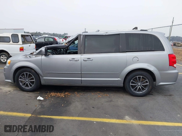 2017 Dodge Grand Caravan SXT with VIN 2C4RDGCG9HR677157, listed as a IAAI auction lot 41470342 with 66,611 mi miles and . Bid and sale history available at DreamBid. Image 14.