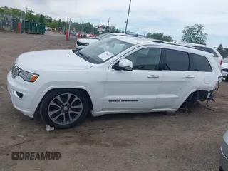 2017 Jeep Grand Cherokee Overland with VIN 1C4RJFCG6HC941771, listed as a IAAI auction lot 42356577 with 192,318 mi miles and . Bid and sale history available at DreamBid. Image 14.