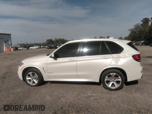 2014 BMW X5 xDrive35i with VIN 5UXKR0C56E0H18800, listed as a IAAI auction lot 40843200 with 129,991 mi miles. Bid and sale history available at carsss.com. Image 14.