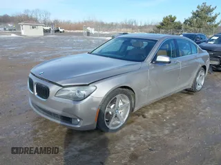 2012 BMW 7 Series 740i with VIN WBAKA4C58CDS99381, listed as a IAAI auction lot 41655715 with 112,731 mi miles and . Bid and sale history available at DreamBid. Image 2.