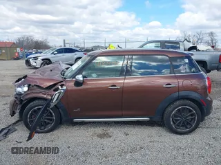 2016 MINI Countryman S z VIN WMWZC5C55GWU01180, wystawiony jako IAAI lot #41874470 z przebiegiem 194 997 mil mil oraz . Historia ofert i sprzedaży dostępna na DreamBid. Obrazek 14.