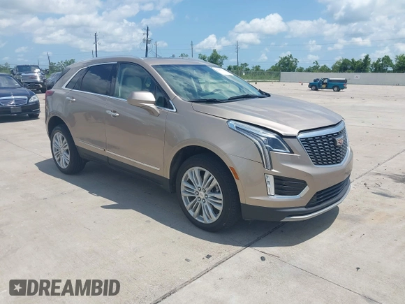 2022 Cadillac XT5 AWD Premium Luxury with VIN 1GYKNDRSXNZ112680, listed as a IAAI auction lot 42389521 with 12,365 mi miles and . Bid and sale history available at DreamBid. Image 1.