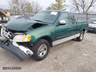 1999 Ford F-150 Work Series with VIN 1FTRX17W6XNB96123, listed as a IAAI auction lot 41943786 with 156,047 mi miles. Bid and sale history available at carsss.com. Image 17.