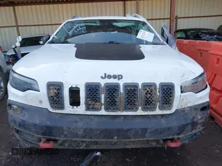 2021 Jeep Cherokee Trailhawk with VIN 1C4PJMBX4MD153086, listed as a IAAI auction lot 41132030 with 56,367 mi miles and . Bid and sale history available at DreamBid. Image 12.