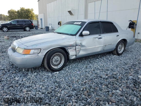 1999 Mercury Grand Marquis LS with VIN 2MEFM75WXXX682027, listed as a Copart auction lot 53906165 with 116,616 mi miles and Salvage Title. Bid and sale history available at DreamBid. Image 1.