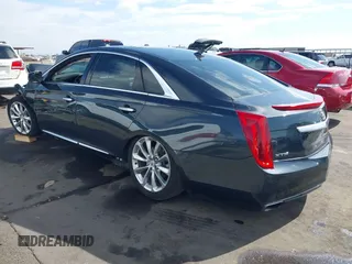 2013 Cadillac XTS Luxury with VIN 2G61P5S31D9182553, listed as a IAAI auction lot 42076227 with 116,849 mi miles and . Bid and sale history available at DreamBid. Image 3.