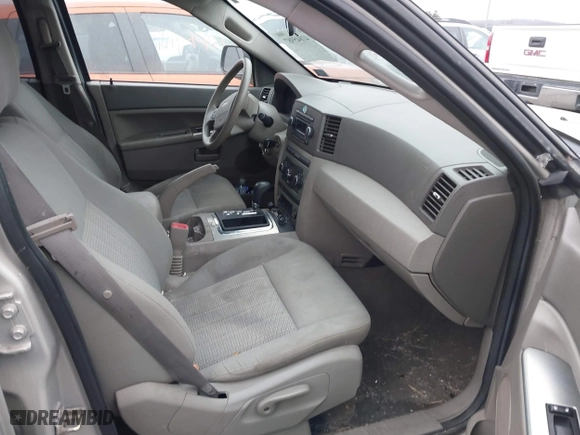 2007 Jeep Grand Cherokee Laredo with VIN 1J8GR48K17C537088, listed as a IAAI auction lot 41845987 with 143,661 mi miles. Bid and sale history available at carsss.com. Image 5.