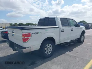 2013 Ford F-150 XL with VIN 1FTFW1ET1DFA58297, listed as a IAAI auction lot 42117924 with 202,830 mi miles and . Bid and sale history available at carsss.com. Image 4.