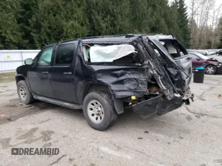 2010 Chevrolet Suburban LS z VIN 1GNUKHE3XAR192464, wystawiony jako Copart lot #87311324 z przebiegiem Nie podano mil oraz Szkoda całkowita • Salvage title. Historia ofert i sprzedaży dostępna na DreamBid. Obrazek 2.