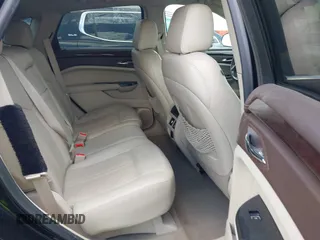 2016 Cadillac SRX Luxury Collection with VIN 3GYFNBE3XGS504059, listed as a IAAI auction lot 42306894 with 87,933 mi miles and . Bid and sale history available at DreamBid. Image 8.
