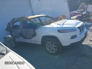 2014 Jeep Cherokee Altitude with VIN 1C4PJMCB5EW120946, listed as a IAAI auction lot 41348100 with Not Provided miles and . Bid and sale history available at DreamBid. Image 12.
