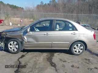 2004 Kia Spectra LX with VIN KNAFE121745039519, listed as a IAAI auction lot 41482402 with 201,123 mi miles. Bid and sale history available at carsss.com. Image 15.