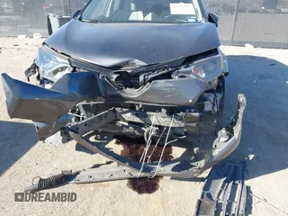 2018 Toyota RAV4 XLE with VIN 2T3WFREV0JW451962, listed as a IAAI auction lot 41670185 with 75,718 mi miles. Bid and sale history available at carsss.com. Image 6.