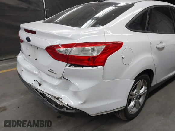 2014 Ford Focus SE with VIN 1FADP3F22EL437727, listed as a IAAI auction lot 42001593 with 90,814 mi miles. Bid and sale history available at carsss.com. Image 6.
