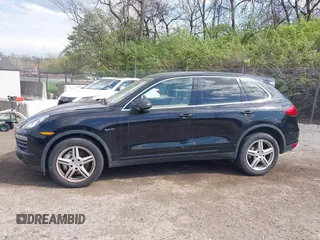 2011 Porsche Cayenne S Hybrid with VIN WP1AE2A27BLA91799, listed as a IAAI auction lot 42035613 with 131,480 mi miles. Bid and sale history available at carsss.com. Image 6.