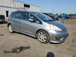 2010 Honda Fit Sport with VIN JHMGE8H47AS023964, listed as a Copart auction lot 61797995 with 78,518 mi miles and Salvage title. Bid and sale history available at DreamBid. Image 4.