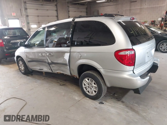 2003 Dodge Grand Caravan with VIN 2D4GP44353R166193, listed as a IAAI auction lot 41908698 with 181,371 mi miles and . Bid and sale history available at DreamBid. Image 3.