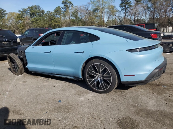 2023 Porsche Taycan with VIN WP0AA2Y11PSA11164, listed as a Copart auction lot 50695385 with 23,833 mi miles and Salvage Title. Bid and sale history available at DreamBid. Image 2.