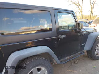 2011 Jeep Wrangler Rubicon with VIN 1J4HA6D11BL564211, listed as a IAAI auction lot 41242240 with 124,039 mi miles and . Bid and sale history available at carsss.com. Image 13.