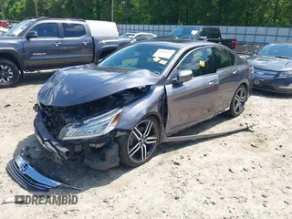 2017 Honda Accord Touring with VIN 1HGCR3F97HA041159, listed as a IAAI auction lot 42205195 with Not provided miles and . Bid and sale history available at DreamBid. Image 2.