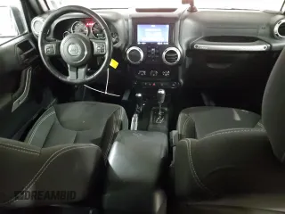 2018 Jeep Wrangler JK Unlimited Sahara with VIN 1C4HJWEGXJL873151, listed as a Copart auction lot 83946904 with 65,230 mi miles and Salvage Title. Bid and sale history available at carsss.com. Image 8.
