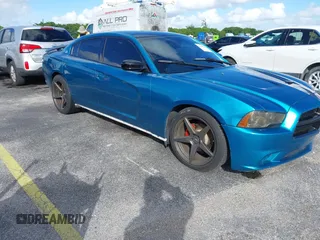 2012 Dodge Charger SXT with VIN 2C3CDXHG0CH185859, listed as a IAAI auction lot 40816799 with 132,572 mi miles. Bid and sale history available at carsss.com. Image 1.