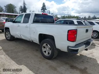 2017 Chevrolet Silverado 1500 LT with VIN 1GCVKREC7HZ131196, listed as a IAAI auction lot 42072336 with 158,140 mi miles. Bid and sale history available at carsss.com. Image 3.
