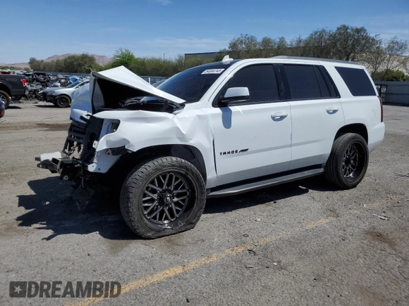 2018 Chevrolet Tahoe LS with VIN 1GNSCAKC0JR296669, listed as a Copart auction lot 54044745 with 147,457 mi miles and Salvage title. Bid and sale history available at DreamBid. Image 1.