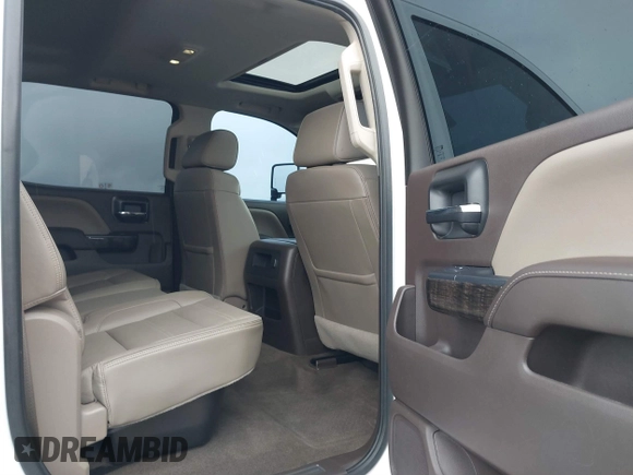 2016 GMC Sierra 2500HD Denali z VIN 1GT12UE89GF172877, wystawiony jako IAAI lot #41807741 z przebiegiem 36 719 mil mil oraz . Historia ofert i sprzedaży dostępna na DreamBid. Obrazek 8.