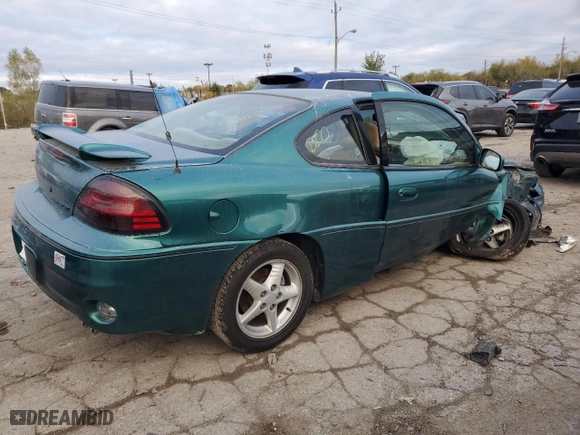 1999 Pontiac Grand Am GT with VIN 1G2NW12E5XM841080, listed as a Copart auction lot 75167674 with NaN miles and Salvage Title. Bid and sale history available at carsss.com. Image 3.
